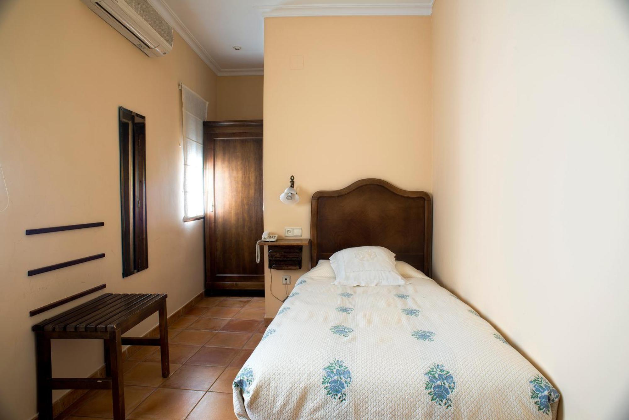 Hotel Don Carlos Caces Pokoj fotografie